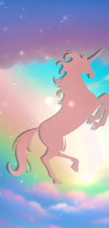 A pink unicorn in a vibrant rainbow sky with fluffy clouds.