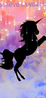 Unicorn silhouette in magical pastel clouds with 'believe in yourself' text.