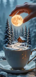 Artistic winter scene in a teacup with cabin and moon.