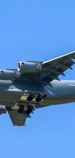 Large aircraft flying against a clear blue sky.