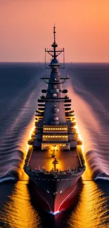 Battleship cruising at sunset with vibrant orange glow on ocean.