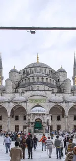 View of the Blue Mosque from an arched corridor in Istanbul.