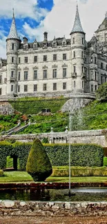 Castle with gardens under a clear blue sky.