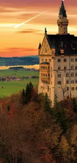 Majestic castle at sunset with vibrant sky and lush forest scenery.