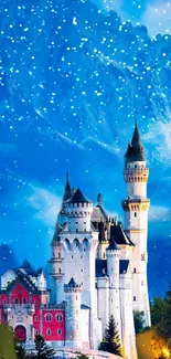 Snow-covered castle with blue sky and mountains in the background wallpaper.