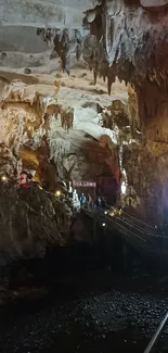 Majestic cave interior with stalactites and ambient lighting for mobile background.