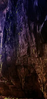 Majestic cave interior with purple hues and natural formations.