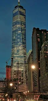 City skyscraper illuminated at night with lights.