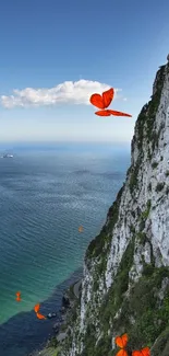 Majestic cliffside with ocean view under a clear blue sky.