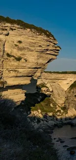 Majestic sunset view of a coastal cliff.