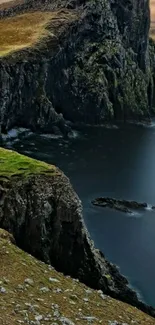 Majestic coastal cliff with ocean view.