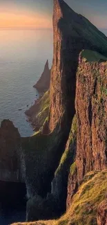 Majestic coastal cliffs with sunset glow.