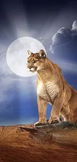 A majestic cougar stands beneath a full moon in a dramatic night sky.