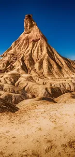 Majestic desert mountain under a clear blue sky.