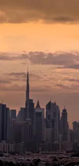 Dubai skyline at sunset with towering skyscrapers and orange sky.