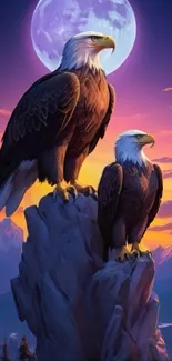 Two eagles perched on a rocky cliff under a moonlit sky with mountains.