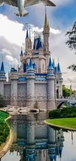 Majestic castle with blue spires and reflections on a tranquil lake.