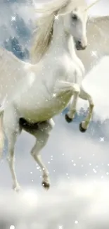 Majestic white unicorn with wings against a cloudy sky.