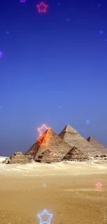 Giza Pyramids under a vivid blue sky with desert foreground.