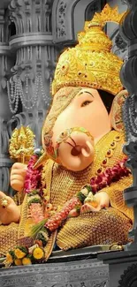 Golden Ganesha statue with intricate decorations.