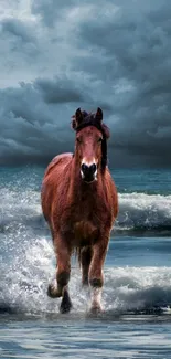 Horse running on beach with crashing waves and dramatic clouds overhead.