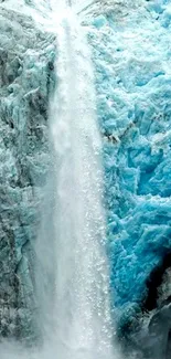 Serene icy waterfall with blue hues.