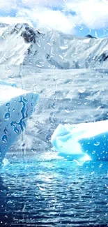 Icebergs float in blue water with snowy mountains under a clear sky.