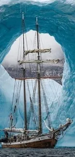 Sailing ship framed by a majestic blue iceberg, creating a stunning scenic view.