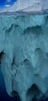 Majestic iceberg underwater view with deep blue hues.