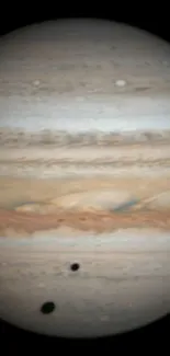 Jupiter planet with cloud bands and shadow on wallpaper.