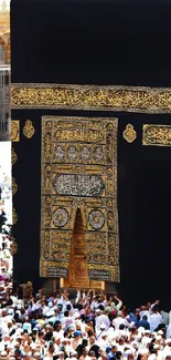 Mobile wallpaper featuring the Kaaba in Mecca surrounded by pilgrims.