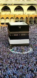 Aerial view of Kaaba surrounded by pilgrims at the Grand Mosque in Mecca.