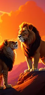 Lion couple standing under a vibrant orange sunset.