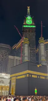 Mecca night scene with Kaaba and clock tower.