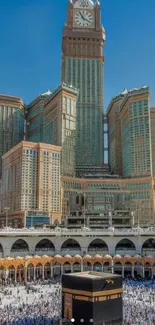 Mecca skyline with Kaaba and clocktower under bright blue sky.