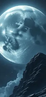 Moonlit mountain and full moon scene.
