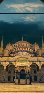 Majestic mosque under dramatic dusk sky, showcasing stunning architecture.