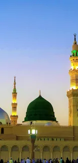 Majestic mosque silhouette at sunset with a vibrant evening sky.