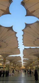 Majestic mosque canopy with blue sky.