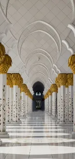 Elegant mosque interior with golden columns and arches.