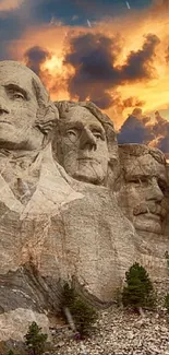 Mount Rushmore at sunset with vibrant sky and majestic rock carvings.