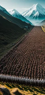 Soldiers march through a stunning mountain valley under a clear sky.