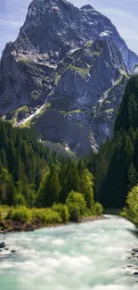 Majestic mountain and serene river wallpaper with lush trees.