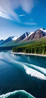 Mountain lake with snowy peaks and a serene blue sky.