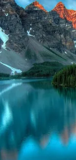 Majestic mountain landscape reflecting in a serene blue lake.