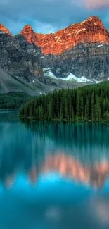 Serene mountain view with lake reflection, perfect for nature wallpaper.