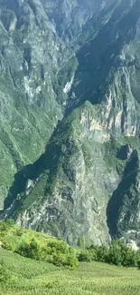 Majestic mountain landscape with lush greenery and dramatic peaks.