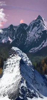 Snow-covered mountains under a purple sky.