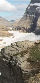 Rugged mountain landscape with cliffs.