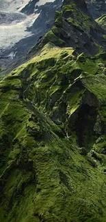 Majestic green mountain landscape with rugged peaks.